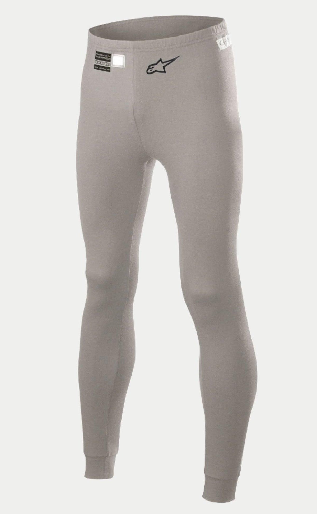Alpinestars Race V2 Underdel FIA, basislag bukser til bilsport, mellemgrå, med sort stjernelogo på benet og FIA-homologeringsmærkat i taljen, letvægts flammehæmmende materiale med manchetter ved anklerne.