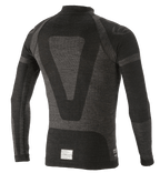 Alpinestars ZX Evo V2 langærmet top, base layer til motorsport, sort og grå, set bagfra med teknisk jacquard-design, sømløs tubulær konstruktion og FIA/SFI-certificeringsmærke ved kanten