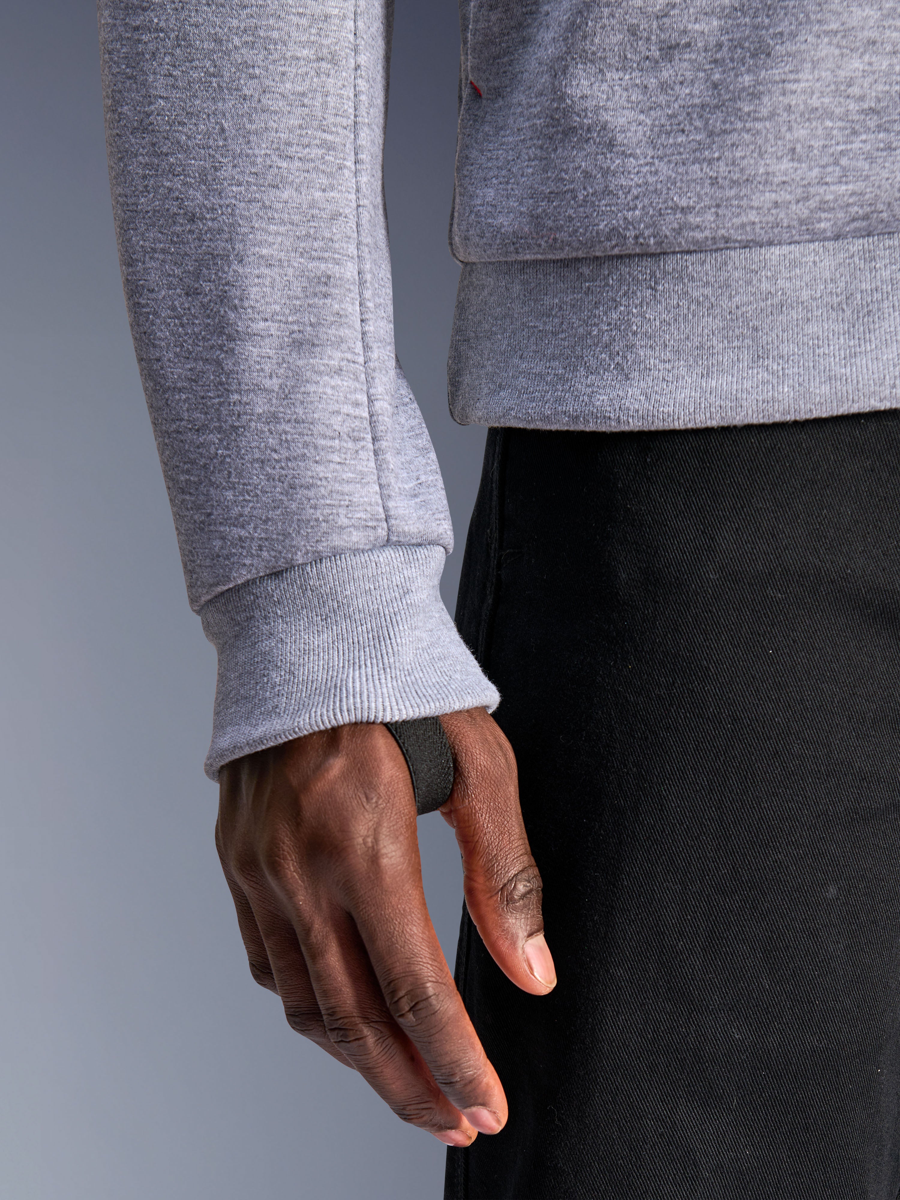 Alpinestars Chrome V2 Sport Hoodie, Gray Heather, close-up of ribbed sleeve cuff with integrated black thumb loop for secure fit, tech fleece material, urban motorcycle gear