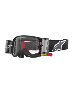 Alpinestars Supertech Corp Goggles Roll Off, Black frame with Clear lens, featuring a Wide Vision Roll-Off system and red pull tab, black strap with a large grey and white Alpinestars logo, technical motocross eyewear with "One Goal. One Vision." branding.