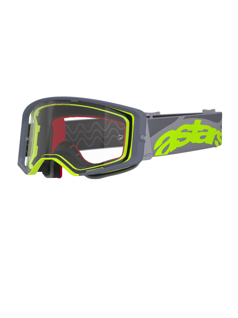 Alpinestars Supertech Stream briller, motocross-briller, grå og neon-gul, klar linse med grå ramme, rødt indvendigt skum, bred grå rem med markant neon-gul astars-branding, professionelt off-road-racerudstyr