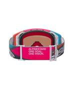 Alpinestars Supertech Stream Goggles, set bagfra, viser bred pink og grå rem med 'ALPINESTARS ONE GOAL. ONE VISION.' branding, multifarvet stel i orange og blå, 3D-formet ansigtsskum, professionelle briller til motocross og off-road