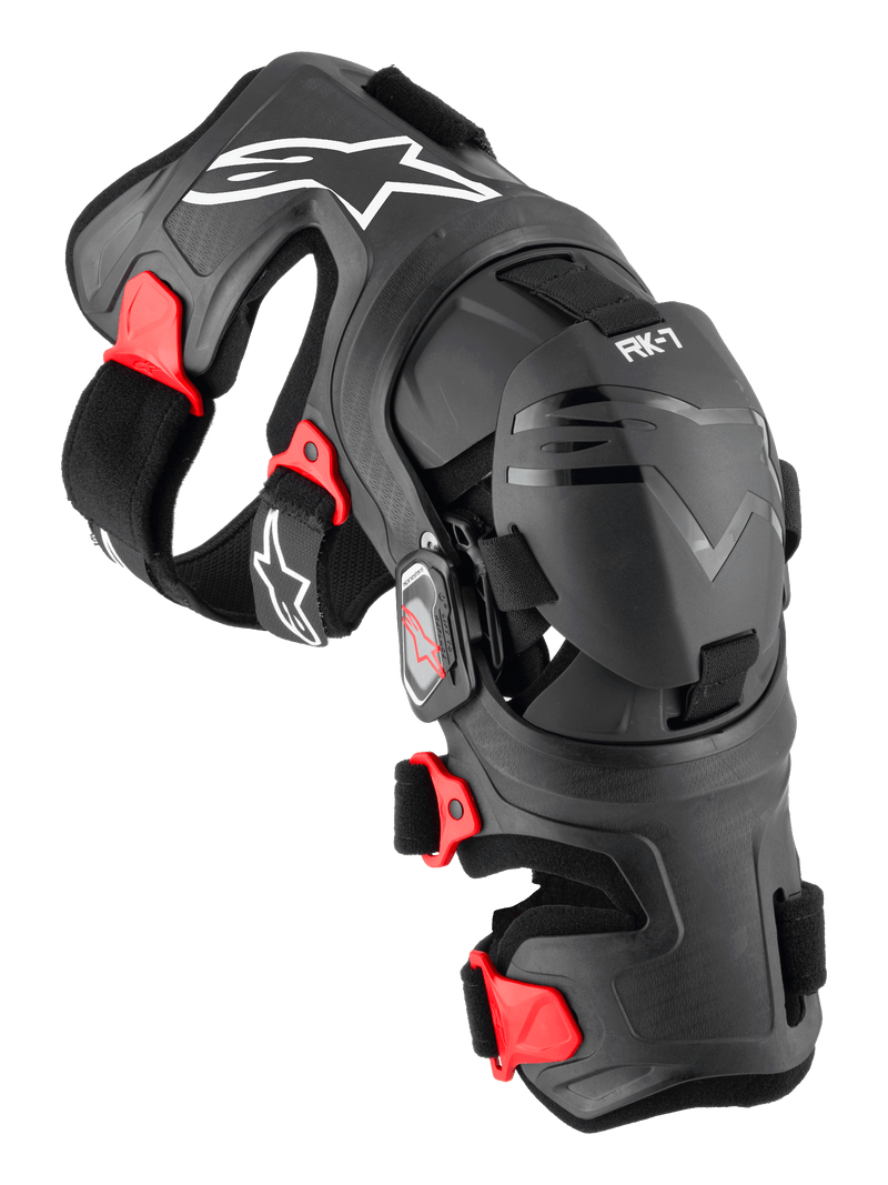 Alpinestars RK-7 Plasma knæskinne, motocross knæbeskytter, sort med røde detaljer og hvide logoer, ergonomisk fiberforstærket ramme med justerbare stropper og fire-punkts hængselsystem, slidstærkt off-road beskyttelsesudstyr