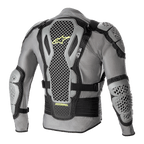 Alpinestars Bionic Action V2 beskyttelsesjakke, set bagfra, grå og sort med neon-gule detaljer, med meget perforerede Cell Technology ryg-, skulder- og albuebeskyttere, gråt mesh-chassis, sorte justerbare stropper og gul Astars-branding