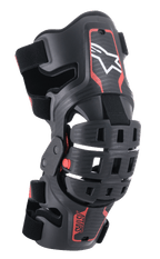 Alpinestars Youth Bionic 5S knæskinne, motocross knæbeskytter, sort og rød, med hvidt stjernelogo, leddelt fire-punkts hængselsystem, robust kompositramme med justerbare stropper, designet til off-road racing til unge