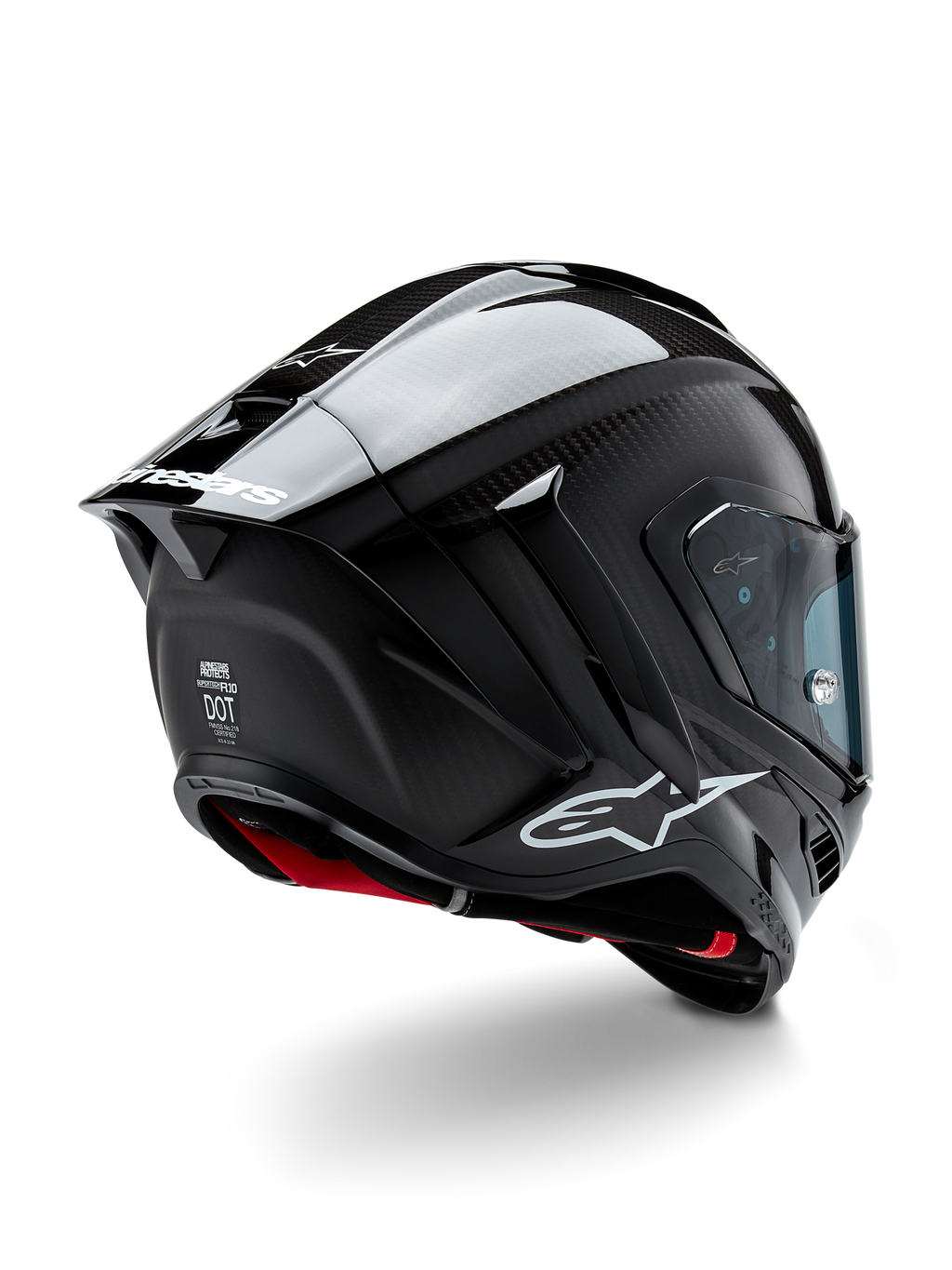 Alpinestars Supertech R10 Solid hjelm, motorcykelracerhjelm, sort carbon med mat og blank finish, trekvart visning bagfra viser kulfiberskal, aerodynamisk spoiler og Alpinestars-branding