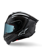Alpinestars Supertech R10 Solid hjelm, full-face motorcykel-racerhjelm, sort karbon mat og blank, synligt kulfibervævsmønster, hvidt Alpinestars-logo på siden, aerodynamisk design med integreret hækspoiler og ventilationsåbninger, sideprofil