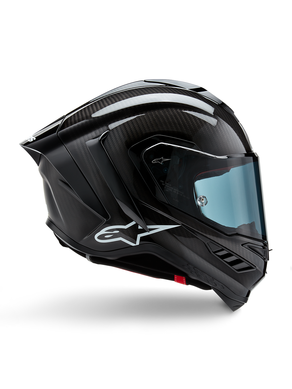 Alpinestars Supertech R10 Solid hjelm, motorcykelracinghjelm, sort kulfiber i mat og blank finish, sideprofil, blåtonet visir, aerodynamisk design med winglets, hvidt logo, højtydende MotoGP-niveau beskyttelse