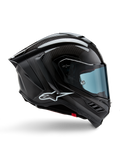 Alpinestars Supertech R10 Solid hjelm, motorcykelracinghjelm, sort kulfiber i mat og blank finish, sideprofil, blåtonet visir, aerodynamisk design med winglets, hvidt logo, højtydende MotoGP-niveau beskyttelse