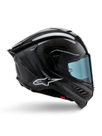 Alpinestars Supertech R10 Solid hjelm, motorcykelracinghjelm, sort kulfiber i mat og blank finish, sideprofil, blåtonet visir, aerodynamisk design med winglets, hvidt logo, højtydende MotoGP-niveau beskyttelse