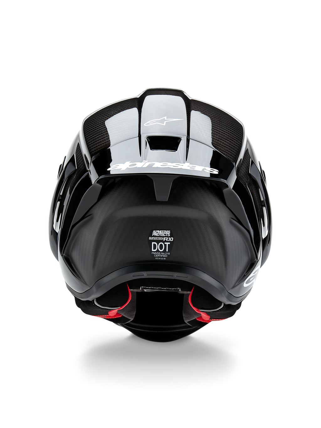 Alpinestars Supertech R10 Solid hjelm, motorcykelhjelm, sort kulfiber mat og blank, set bagfra med kulfibertekstur, aerodynamisk spoiler med hvidt Alpinestars-logo, DOT- og ECE-sikkerhedscertificeringer og rød indvendig polstring