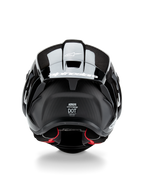 Alpinestars Supertech R10 Solid hjelm, motorcykelhjelm, sort kulfiber mat og blank, set bagfra med kulfibertekstur, aerodynamisk spoiler med hvidt Alpinestars-logo, DOT- og ECE-sikkerhedscertificeringer og rød indvendig polstring