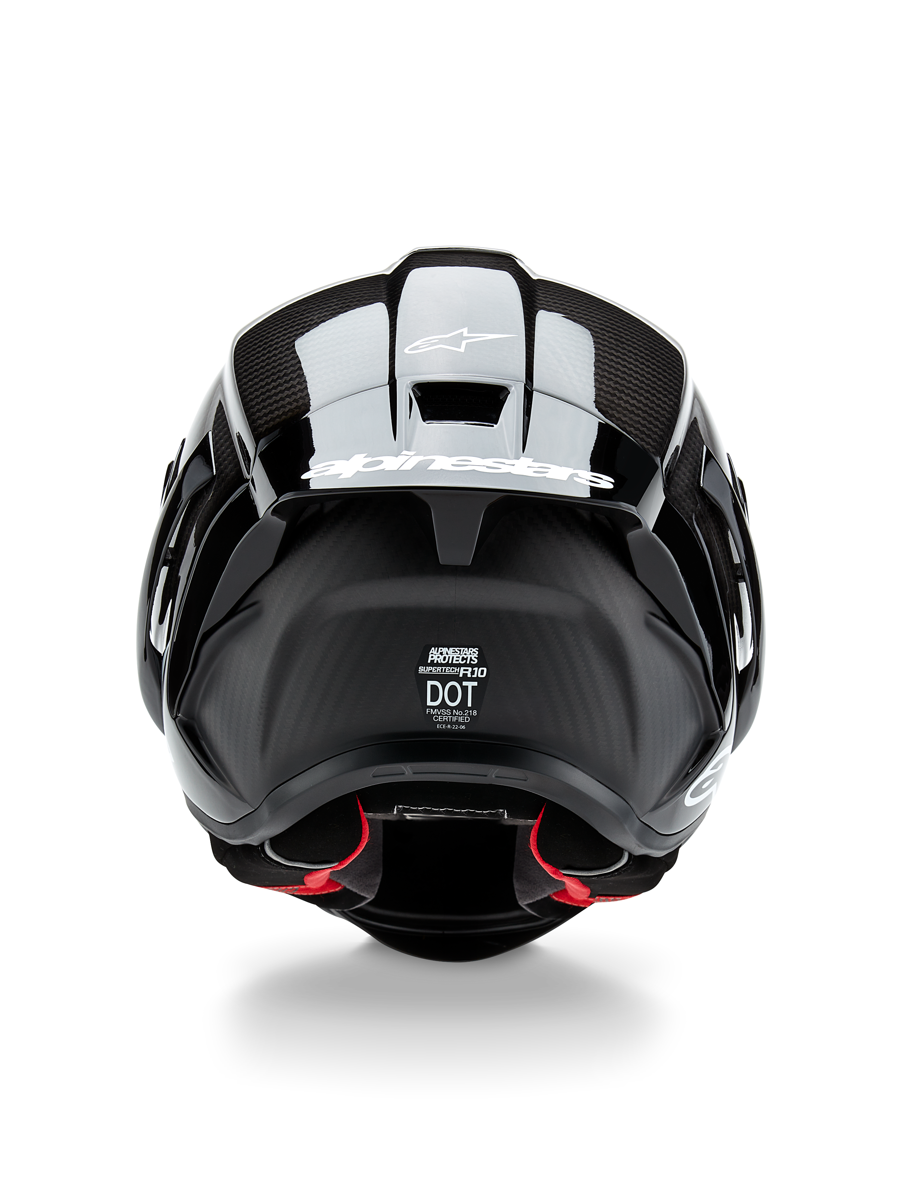 Alpinestars Supertech R10 Solid hjelm, motorcykelhjelm, sort kulfiber mat og blank, set bagfra med kulfibertekstur, aerodynamisk spoiler med hvidt Alpinestars-logo, DOT- og ECE-sikkerhedscertificeringer og rød indvendig polstring