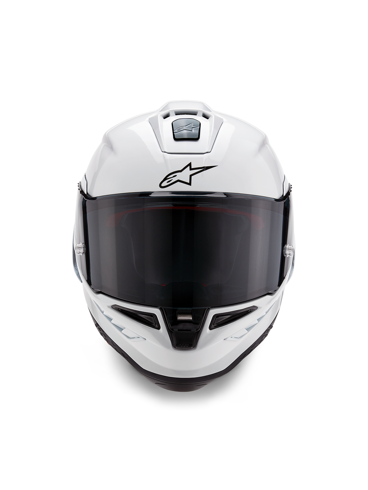 Alpinestars Supertech R10 Solid-hjelm, full-face racerhjelm, blank hvid med sorte detaljer, set forfra med mørkt tonet visir, aerodynamisk ventilationssystem og sort Astars-logo