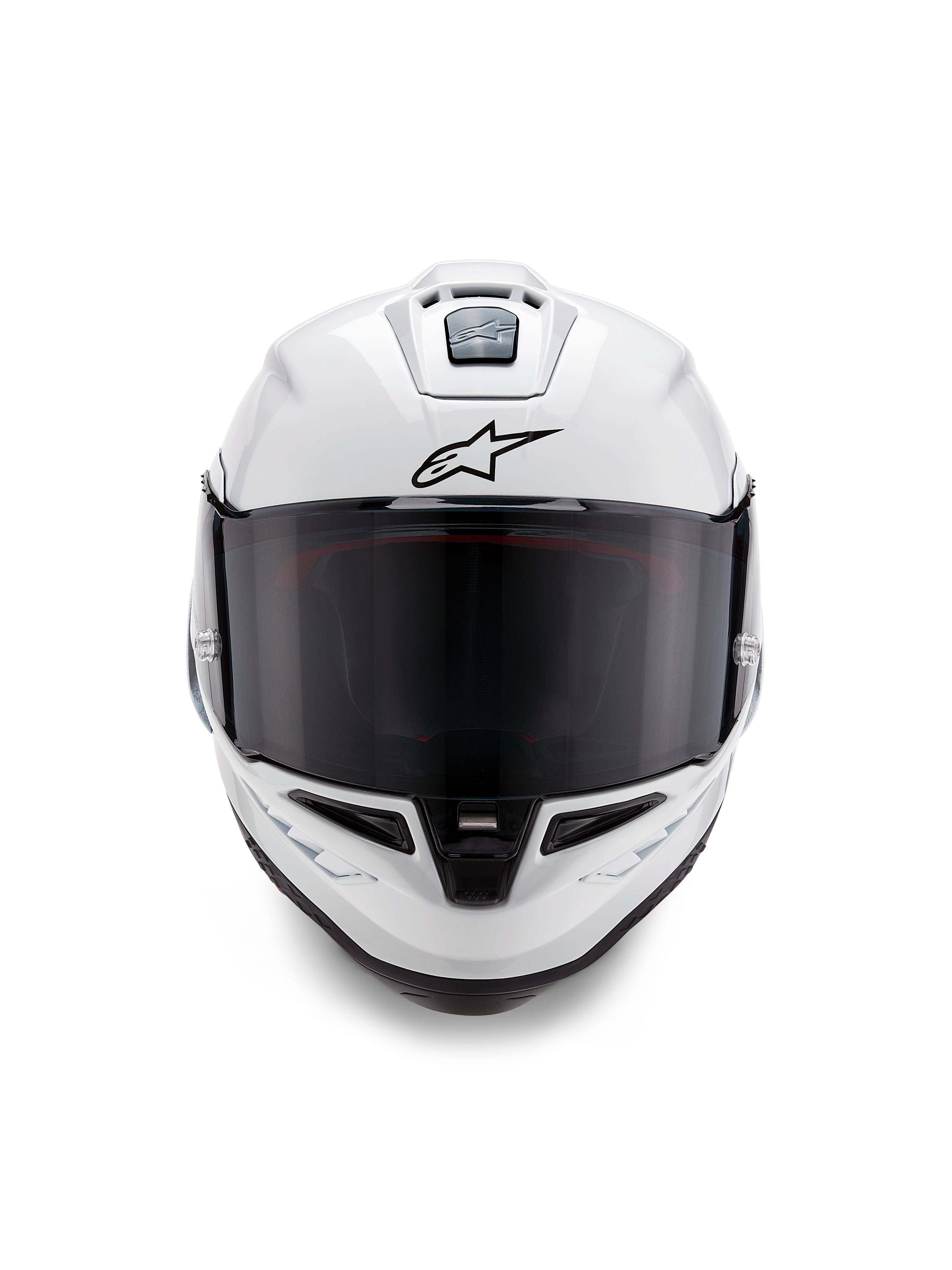 Alpinestars Supertech R10 Solid-hjelm, full-face racerhjelm, blank hvid med sorte detaljer, set forfra med mørkt tonet visir, aerodynamisk ventilationssystem og sort Astars-logo