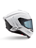 Alpinestars Supertech R10 Solid hjelm, hvid blank og sort mat motorcykelracerhjelm, profilvisning fra siden, aerodynamisk design med winglets bagpå og sideventilation, blåtonet visir, med sort Alpinestars stjernelogo på siden