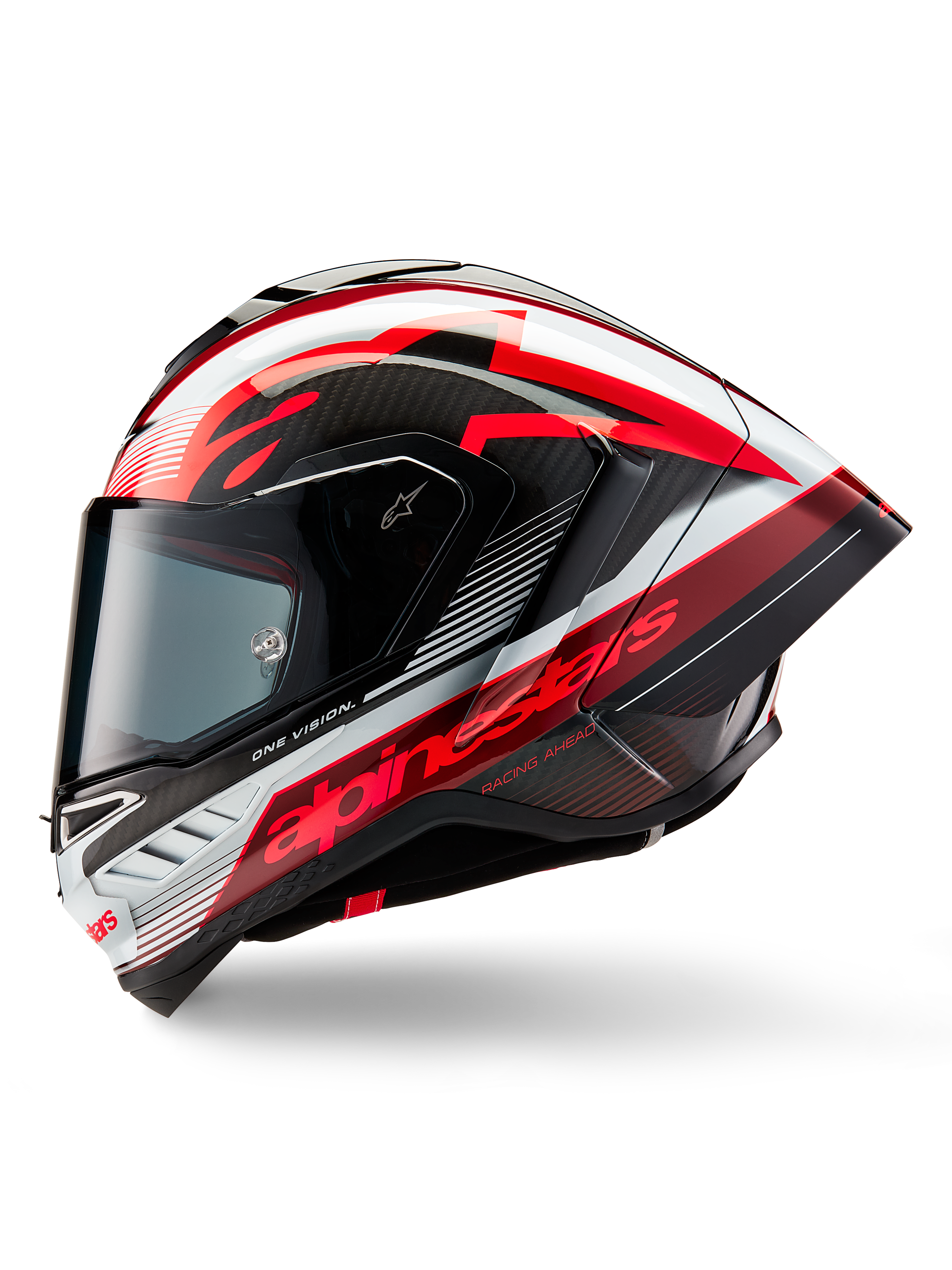 Alpinestars Supertech R10 Team hjelm, full-face motorcykelracerhjelm, sort kulfiber, rød og hvid blank finish, sideprofil der viser det aerodynamiske design, markant rød branding med 'One Vision' og 'Racing Ahead' tekst, strømlinet kulfiberkonstruktion til professionel ydeevne.
