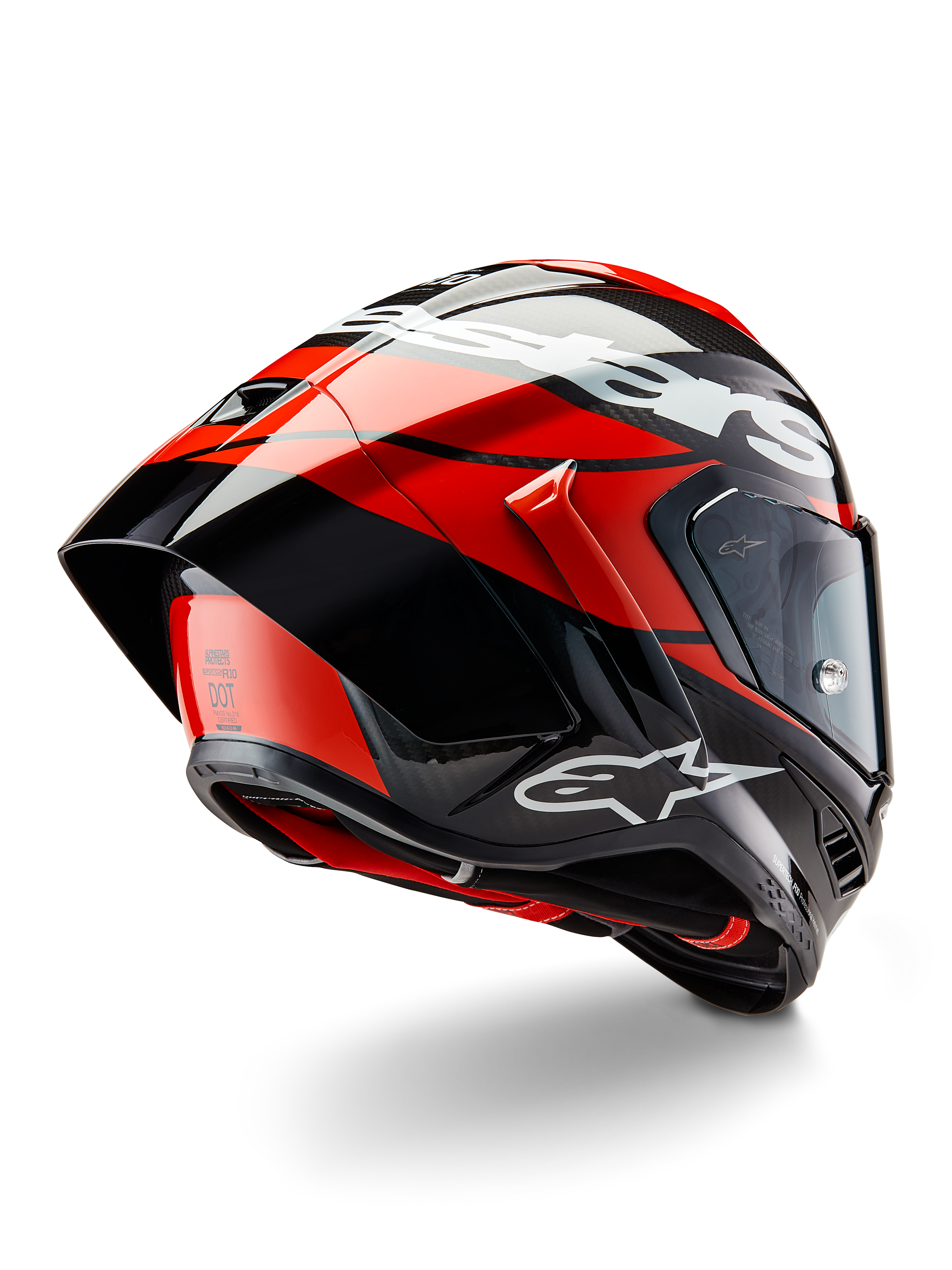 Alpinestars Supertech R10 Element hjelm, sort kulfiber, klar rød og hvid blank finish, trekvartvisning bagfra med stor aerodynamisk spoiler og kulfiberskal, markante Alpinestars-logoer og DOT-certificering