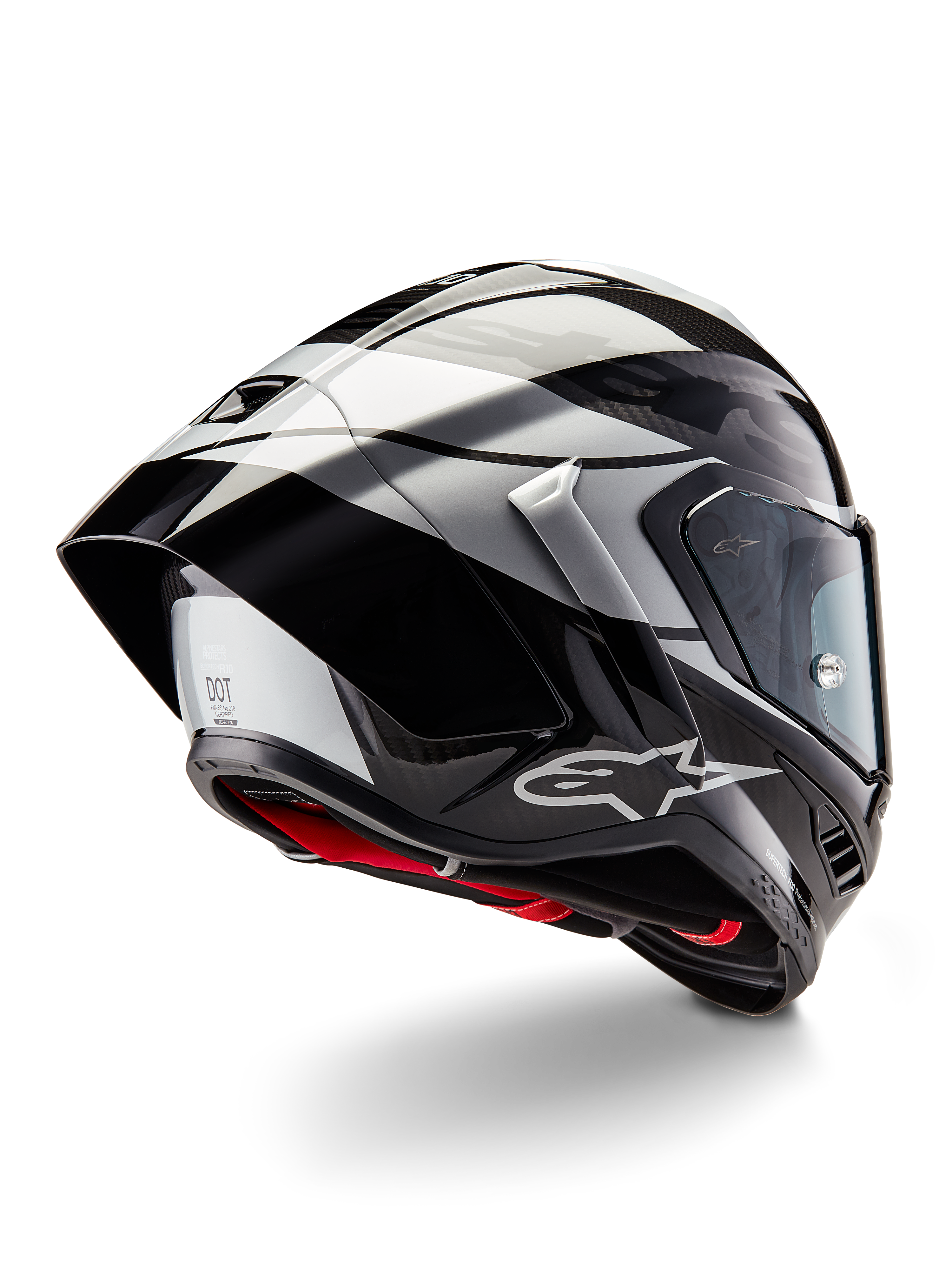 Alpinestars Supertech R10 Element-hjelm, Black Carbon Silver Black Glossy, trekvart visning bagfra som viser den aerodynamiske racerprofil, blank kulfiberskal med geometrisk grå og sort grafik, Alpinestars-logo og rød indvendig polstring