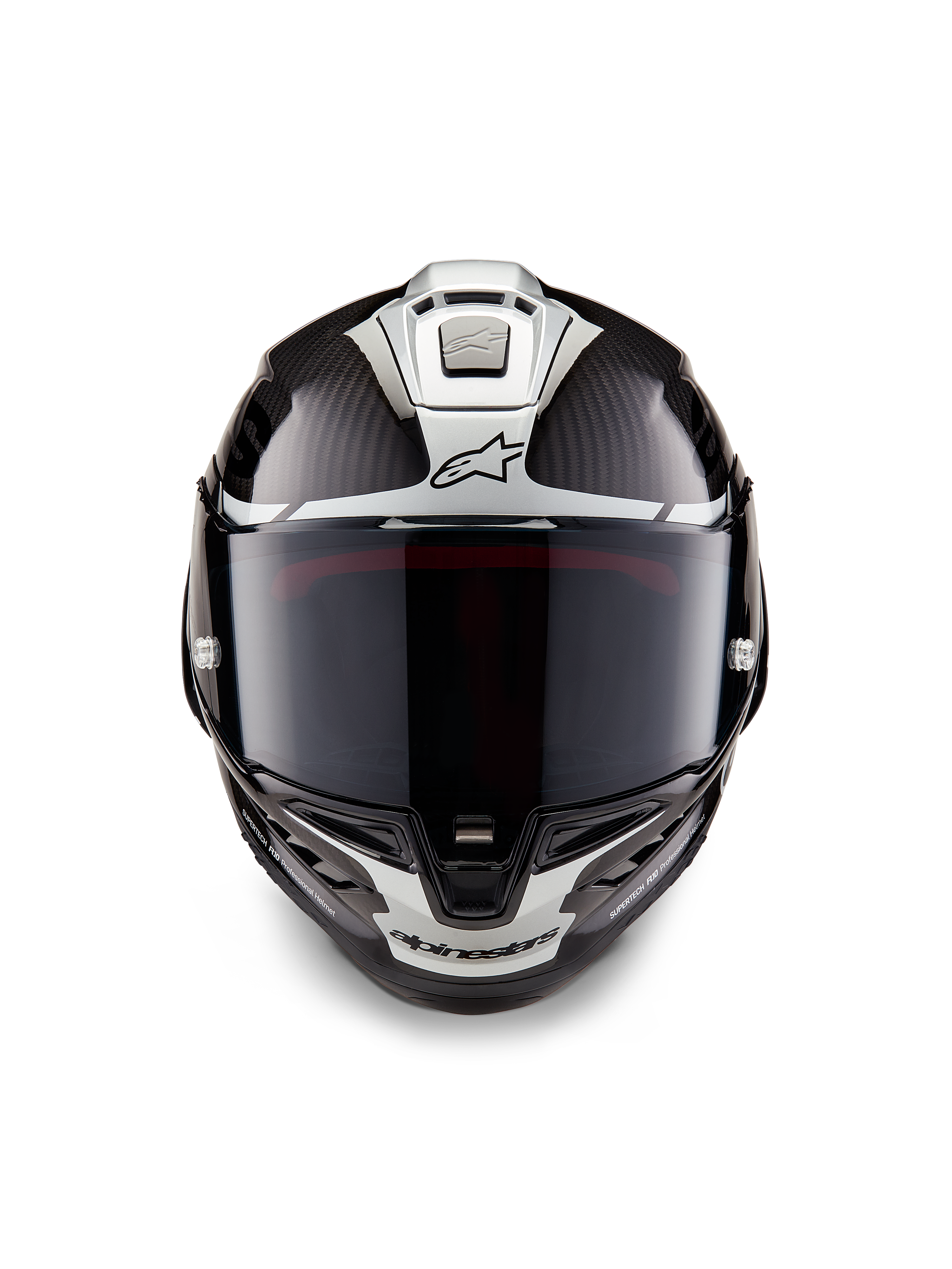 Alpinestars Supertech R10 Element hjelm, full-face racerhjelm, sort kulfiber sølv sort blank, set forfra med mørkt røgfarvet visir, blank kulfibervævning, sølvfarvet aerodynamisk grafik og Alpinestars-logoer