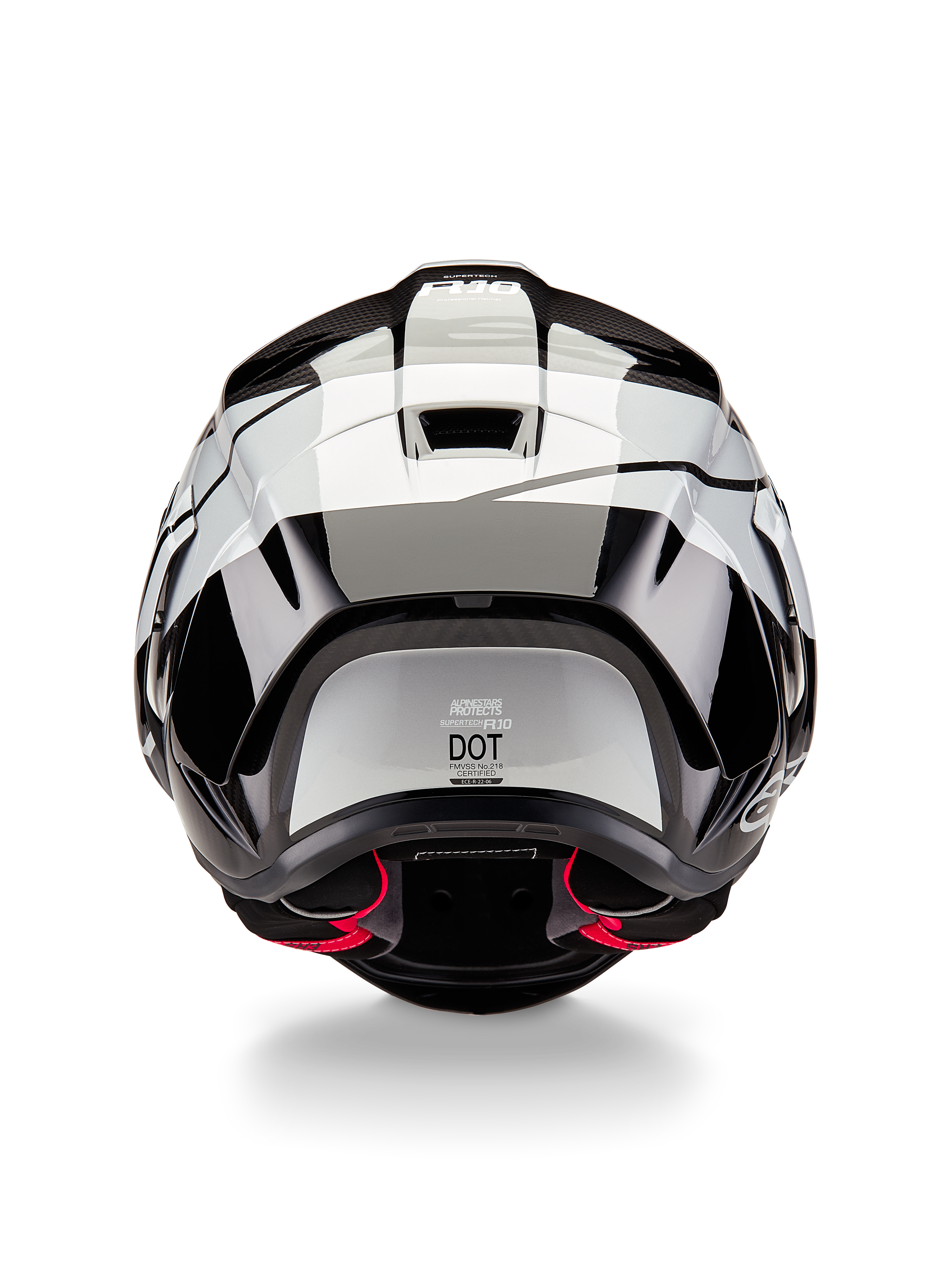 Alpinestars Supertech R10 Element hjelm, set bagfra, Black Carbon Silver Black Glossy, med aerodynamisk spoilerdesign, DOT-certificeringsmærke og røde detaljer på den indvendige polstring, professionel hovedbeskyttelse til racing