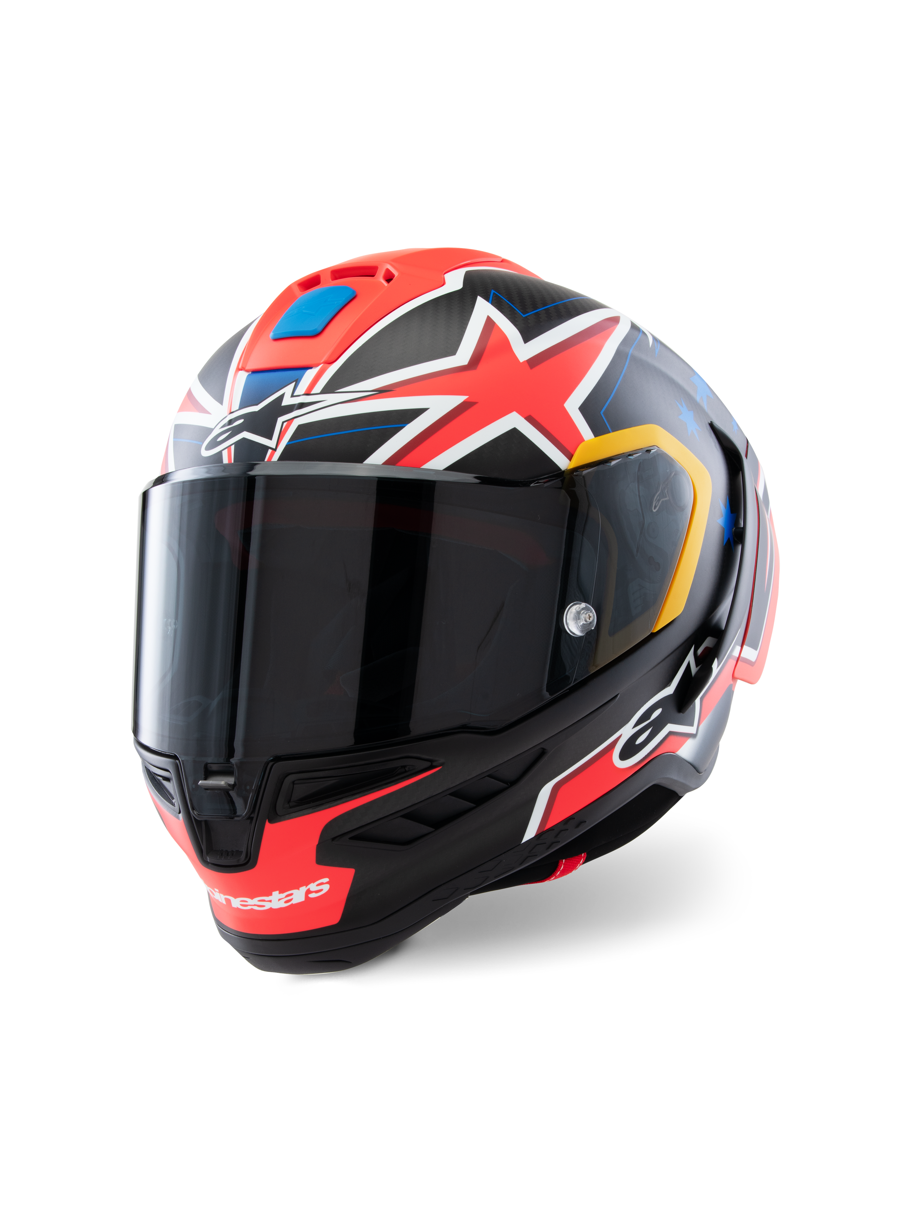 Alpinestars Supertech R10 Miller Limited Edition hjelm, full-face racerhjelm, Carbon Red Matt med røde stjerner, blå og gule grafiske accenter, mørkt røgfarvet visir, aerodynamisk carbonskal til professionelt motorcykelrace