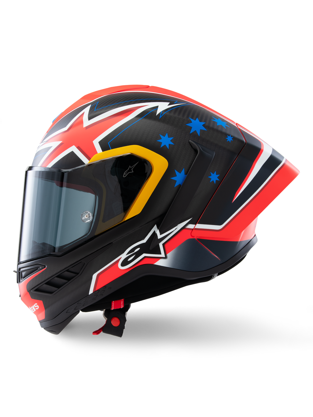Alpinestars Supertech R10 Miller Limited Edition hjelm, set fra siden, Carbon Red Matt finish med synlig kulfibervævning, rød og hvid lyn-grafik, blå stjerner bagpå, gule detaljer omkring visiret og hvidt Alpinestars-logo, højtydende racerhjelm til motorcykel
