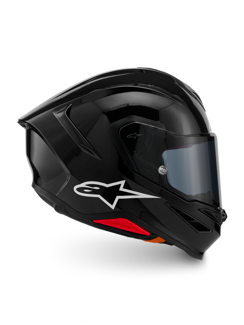 Alpinestars S-R7 Solid Helmet, Full-Face Motorcycle Helmet, Black Glossy, profile view featuring a white A-star logo, streamlined aerodynamic shell with integrated spoiler and red accents at the base, designed for racing and sport performance.