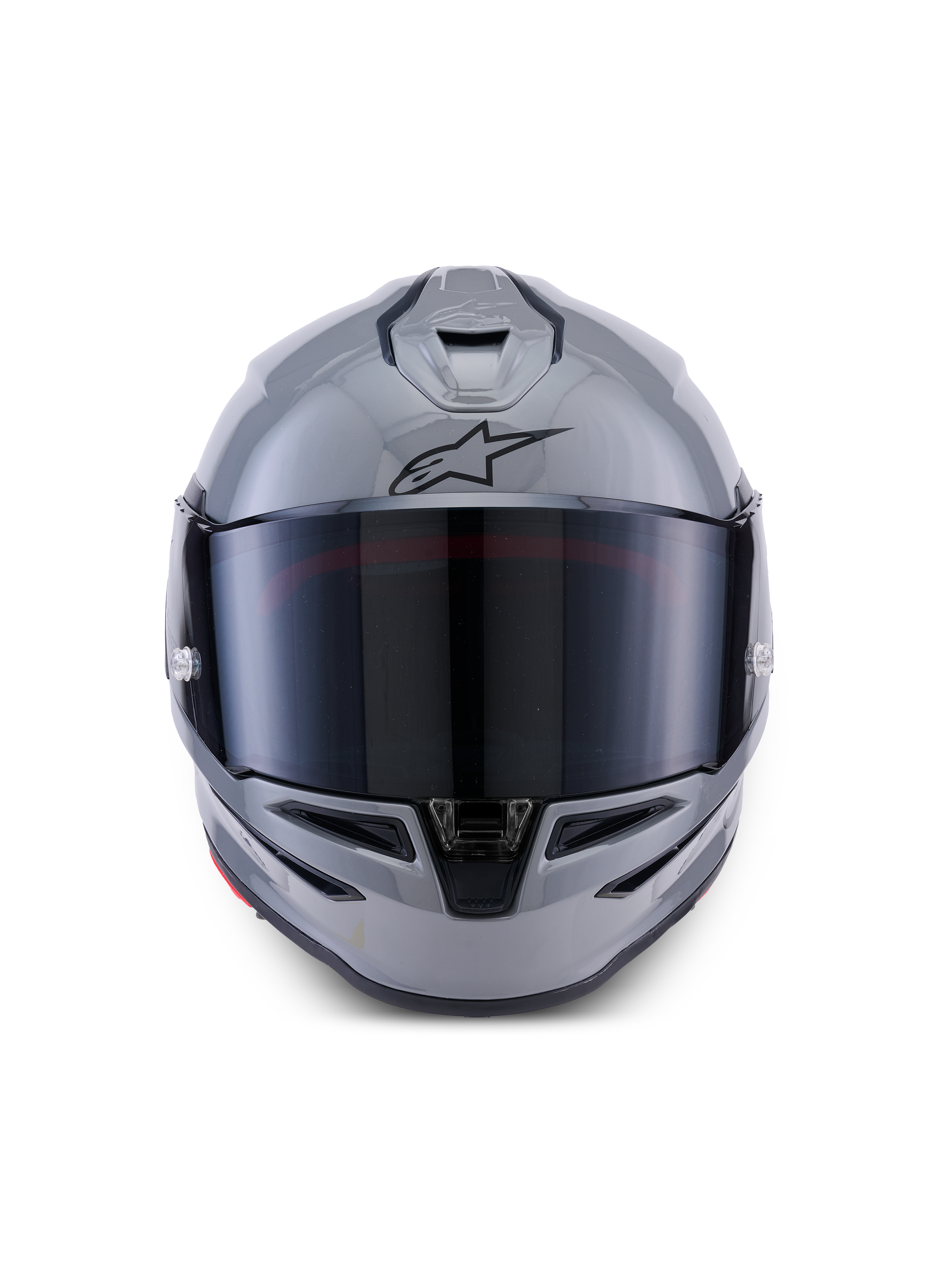 Alpinestars S-R7 Solid hjelm, full-face motorcykelhjelm, grå glossy, set forfra med mørkt tonet visir, sort A-star logo på panden, aerodynamisk skal med integreret ventilation, designet til racing og sportspræstationer.