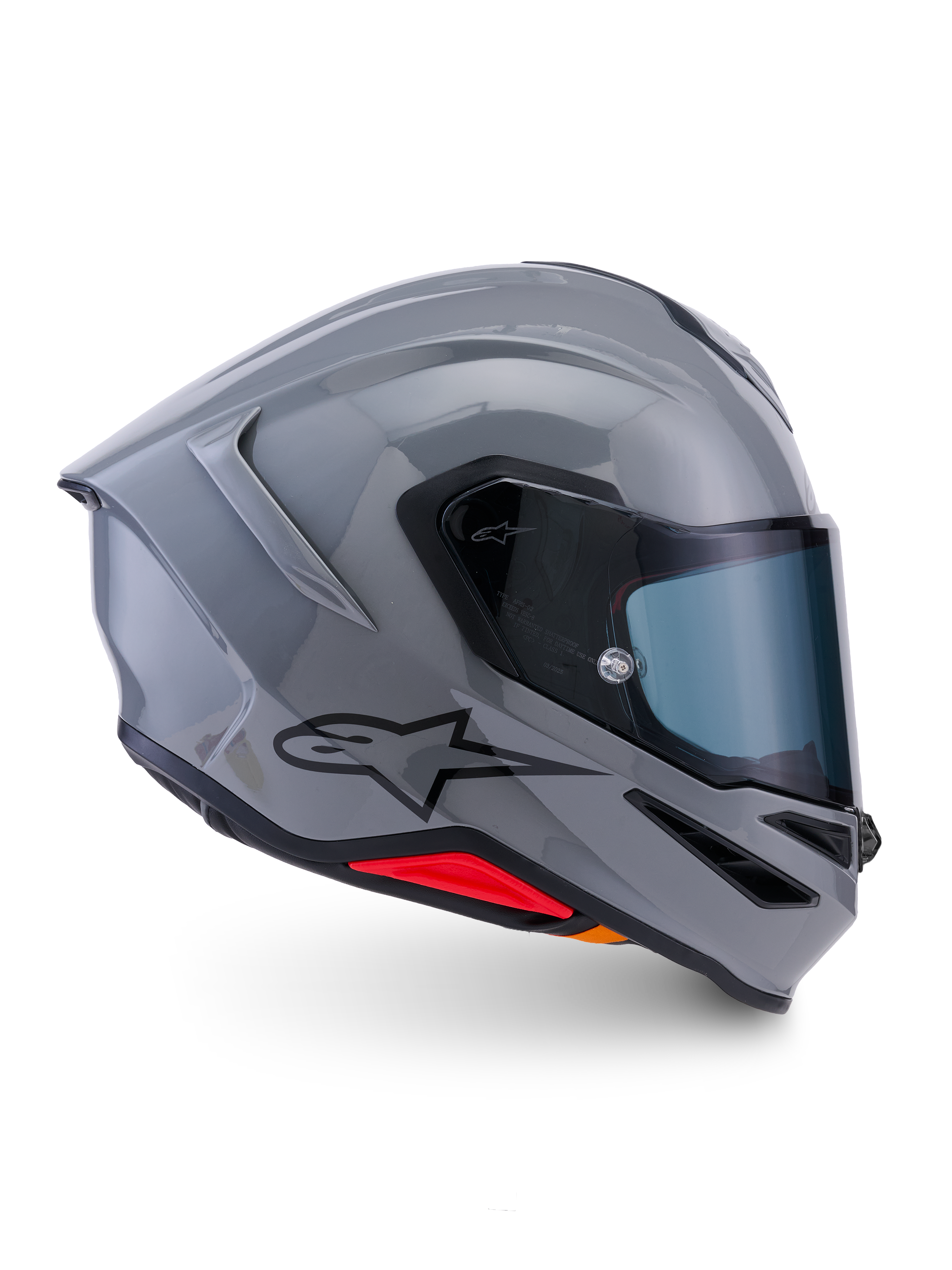 Alpinestars S-R7 Solid hjelm, fuld-face motorcykelhjelm, blank grå, sideprofil, blank grå aerodynamisk skal med sort logo og røde detaljer ved bunden, højtydende racingudstyr