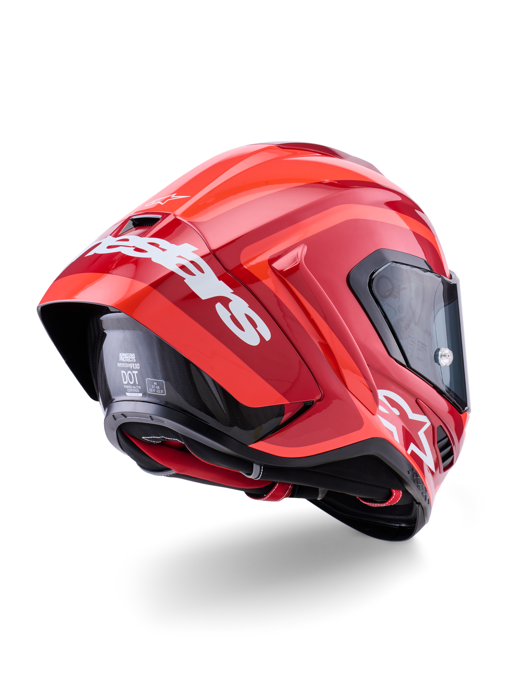 Alpinestars Supertech R10 Arius-hjelm, blank rød med hvid branding, set skråt bagfra, der viser den aerodynamiske spoiler, skalkonstruktion i kulfiber og en slank racerprofil med mørkt visir
