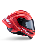 Alpinestars Supertech R10 Arius-hjelm, full-face racerhjelm, blank rød og orange, sideprofil med en aerodynamisk bagspoiler, hvidt Astars-logo på hagen og klart visir, konstrueret til højtydende kørsel på banen