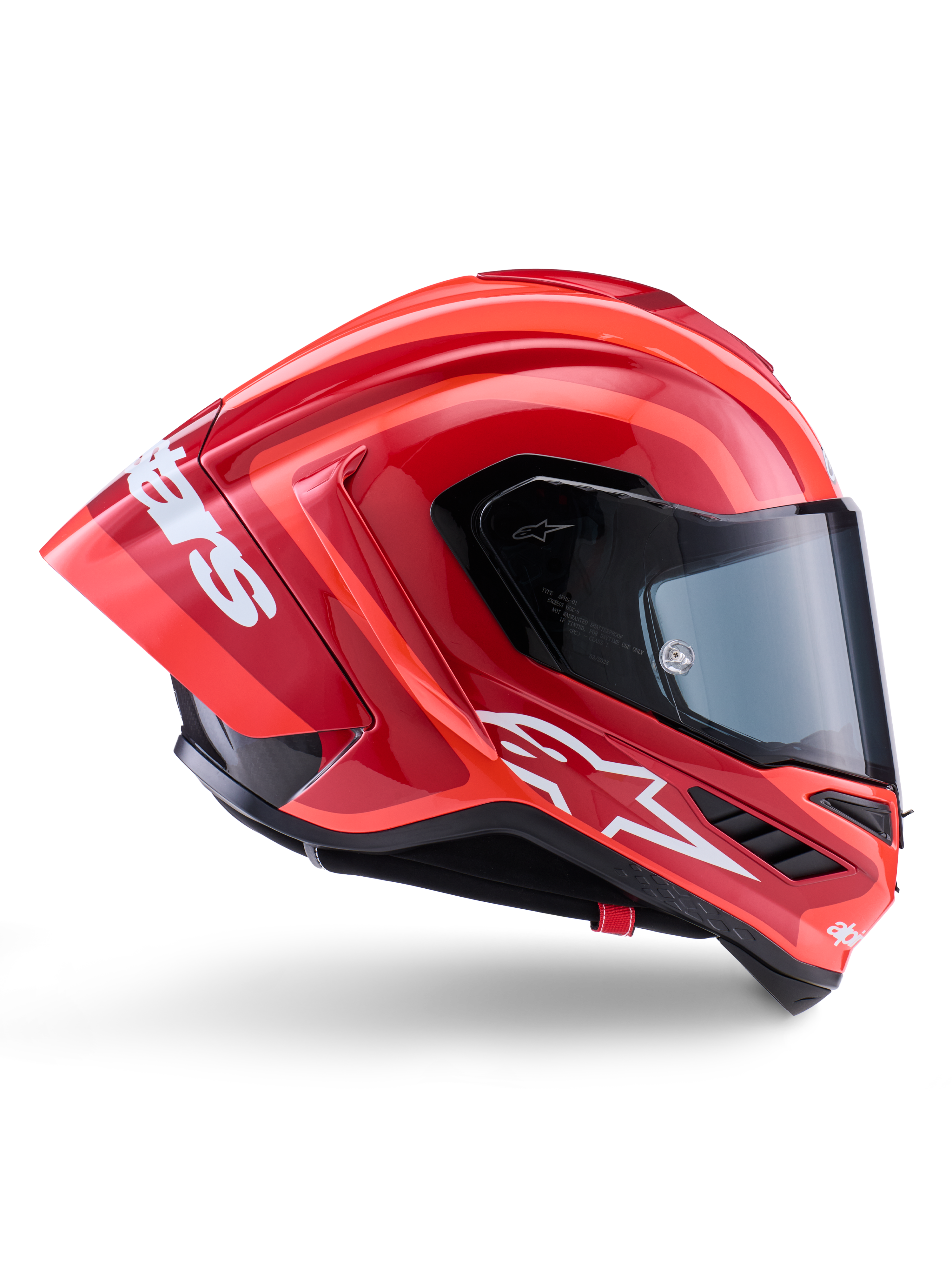 Alpinestars Supertech R10 Arius-hjelm, full-face racerhjelm, blank rød og orange, sideprofil med en aerodynamisk bagspoiler, hvidt Astars-logo på hagen og klart visir, konstrueret til højtydende kørsel på banen