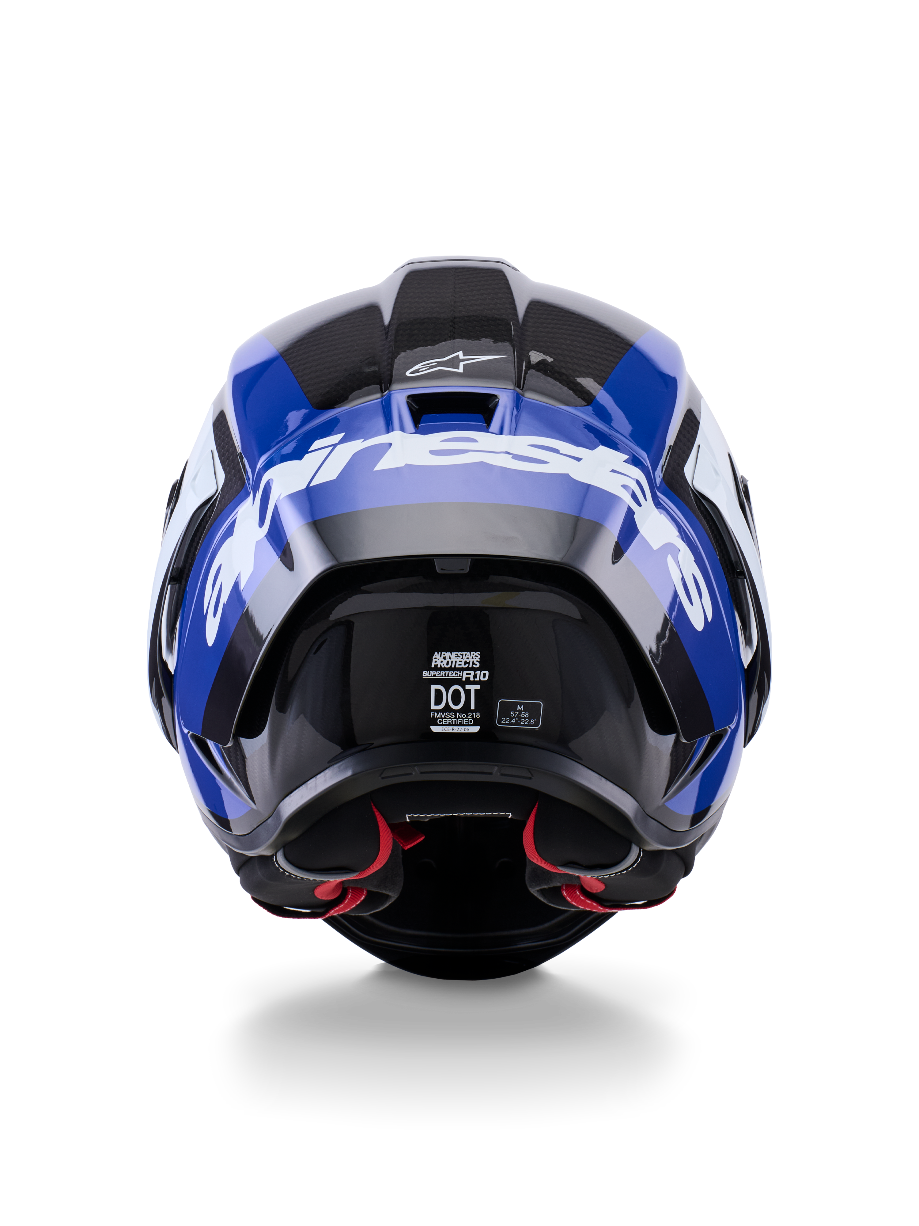 Alpinestars Supertech R10 Arius-hjelm, set bagfra, blank sort, hvid og blå, kulfiberkonstruktion med markant hvid branding, aerodynamisk form, DOT-certificeret mærkat, rød indvendig polstring