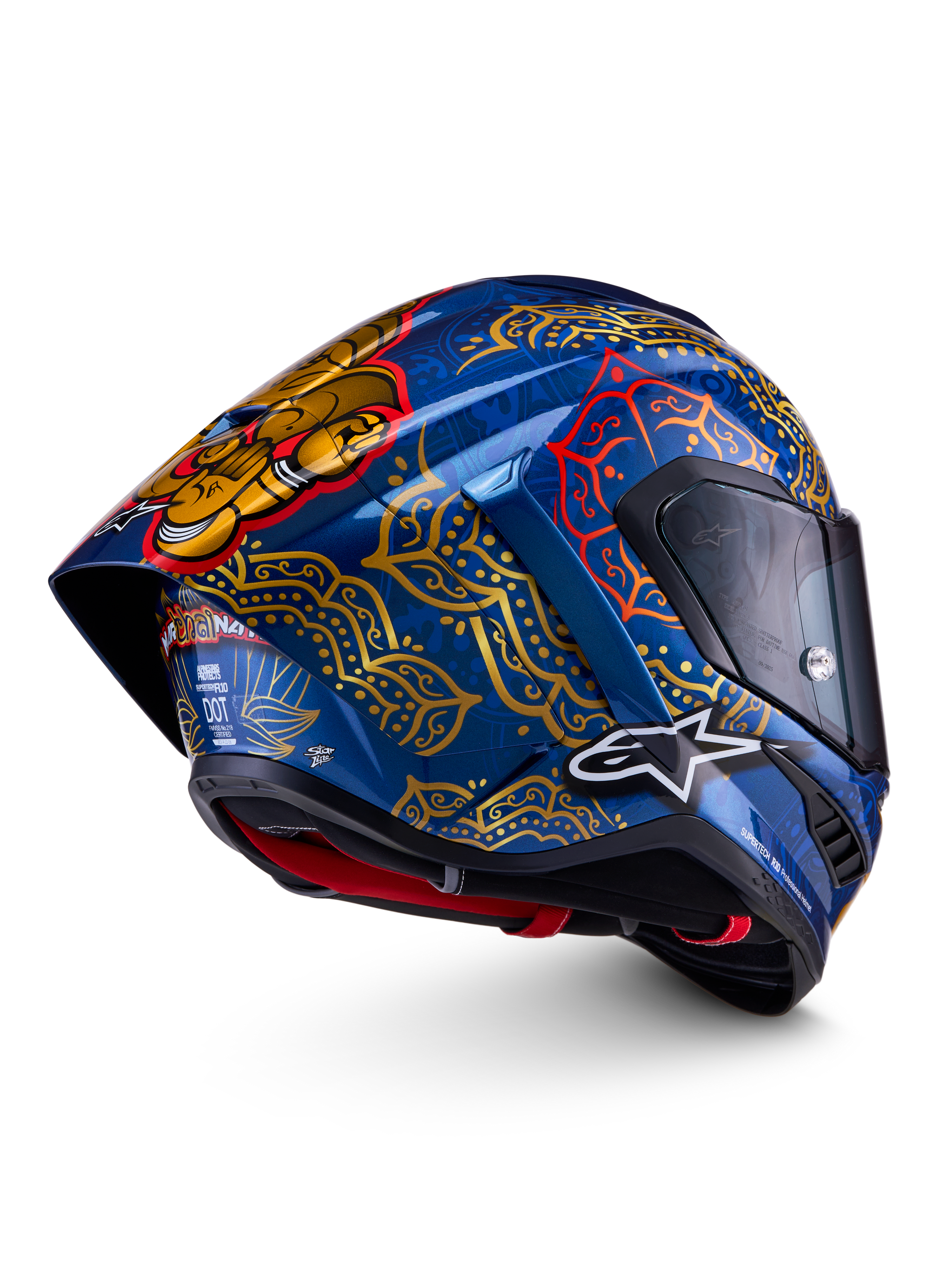 Alpinestars Supertech R10 Martinator Thai-hjelm i blank blå med gyldne mandalamønstre og bagspoiler.