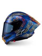 Supertech R10 Martinator Thai-hjelm i kulfiber, skinnende blå med mandala-grafik i guld og rød, set fra siden.