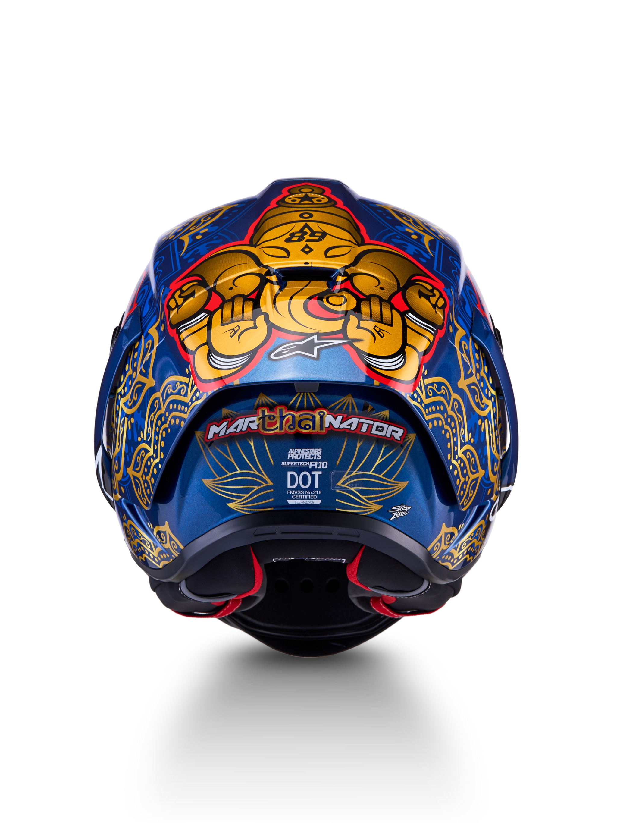 Supertech R10 Martinator Thai-hjelm set bagfra, blank blå kulfiberskal med detaljeret guld-grafik.