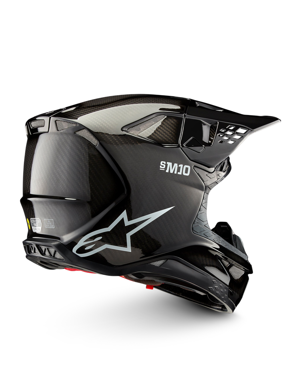 Alpinestars Supertech M10 Solid hjelm ECE 22.06, sort blank kulfiber-motocrosshjelm set fra siden med ventilationsåbninger og skyggevisir, ECE-godkendt