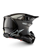 Alpinestars Supertech M10 Solid hjelm ECE 22.06, sort blank kulfiber-motocrosshjelm set fra siden med ventilationsåbninger og skyggevisir, ECE-godkendt