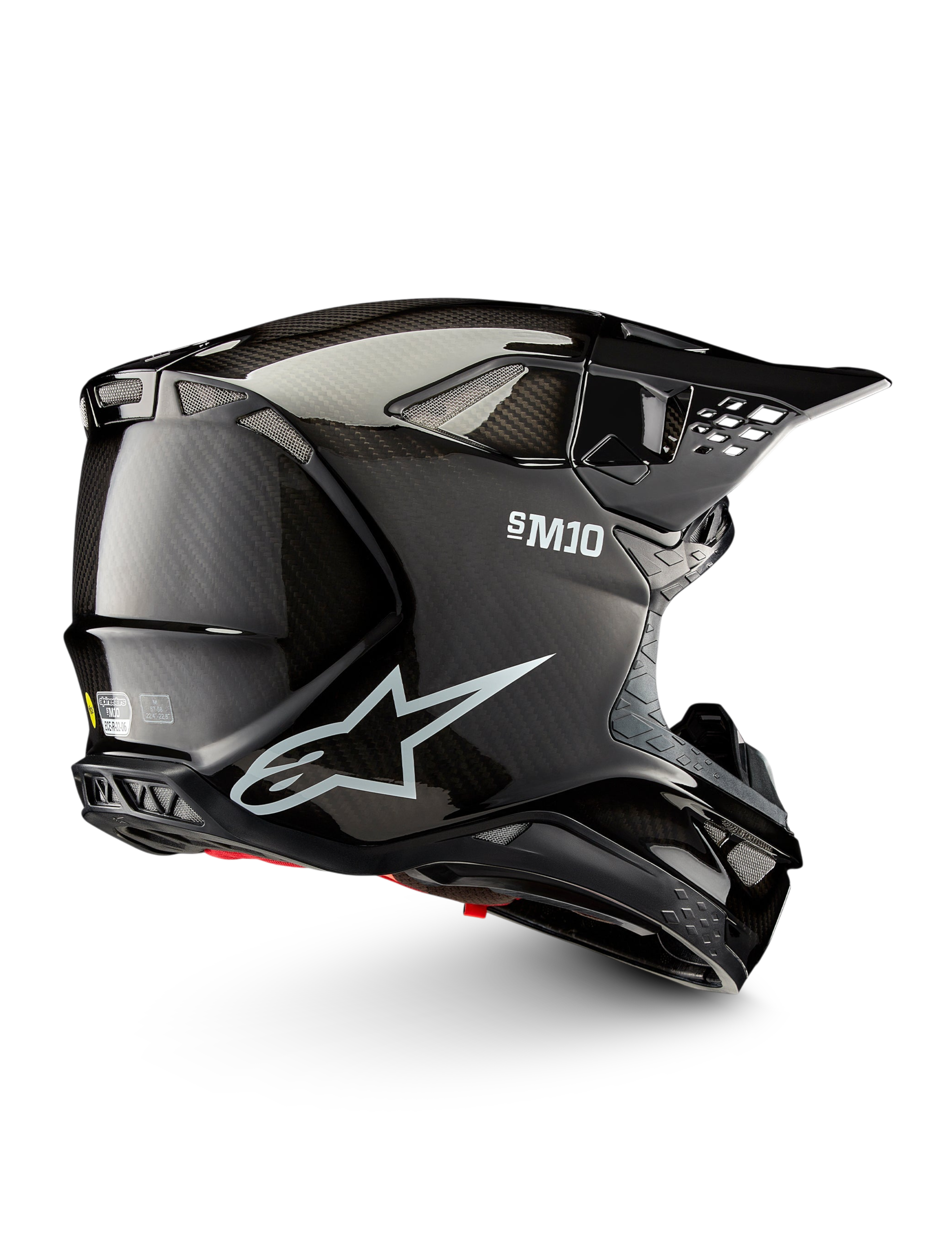 Alpinestars Supertech M10 Solid hjelm ECE 22.06, sort blank kulfiber-motocrosshjelm set fra siden med ventilationsåbninger og skyggevisir, ECE-godkendt