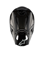 Alpinestars Supertech M10 Solid hjelm ECE 22.06, sort blank kulfiber-motocrosshjelm set bagfra med kulfiberskal, ventilationsåbninger og Alpinestars-logo, ECE 22.06-godkendt