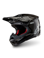 Alpinestars Supertech M10 Solid hjelm ECE 22.06, sort blank motocrosshjelm med kulfiberskal, skyggevisir og rød indvendig foring, vist i trekvart profil.
