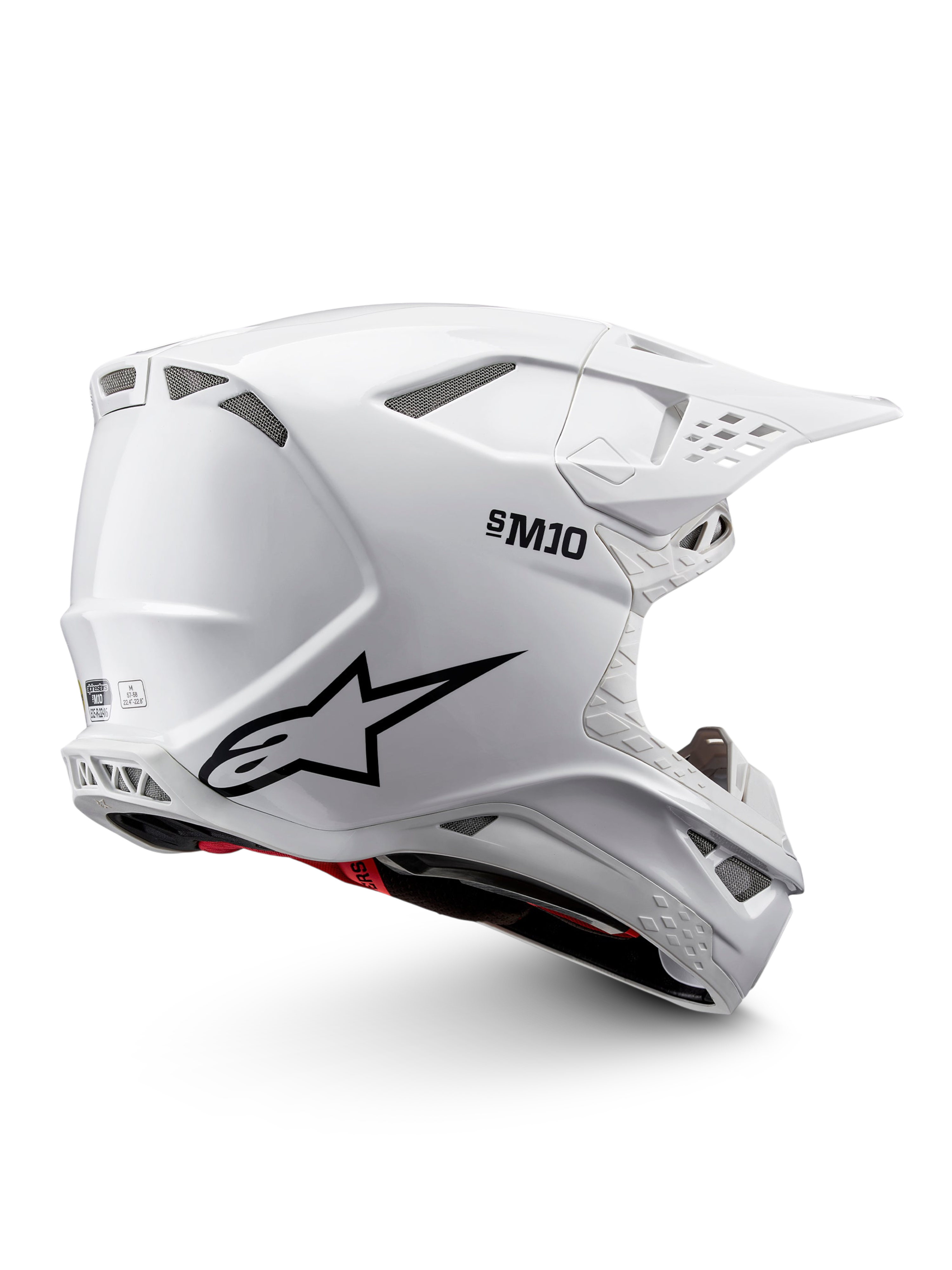 Alpinestars Supertech M10 Solid motocrosshjelm, hvid blank med sorte grafikker, røde detaljer, ventilationsporte og skyggevisir, ECE 22.06-certificeret