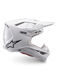 Alpinestars Supertech M10 Solid hjelm ECE 22.06, hvid blank motocrosshjelm med sort logo, skygge og ventileret design set fra siden