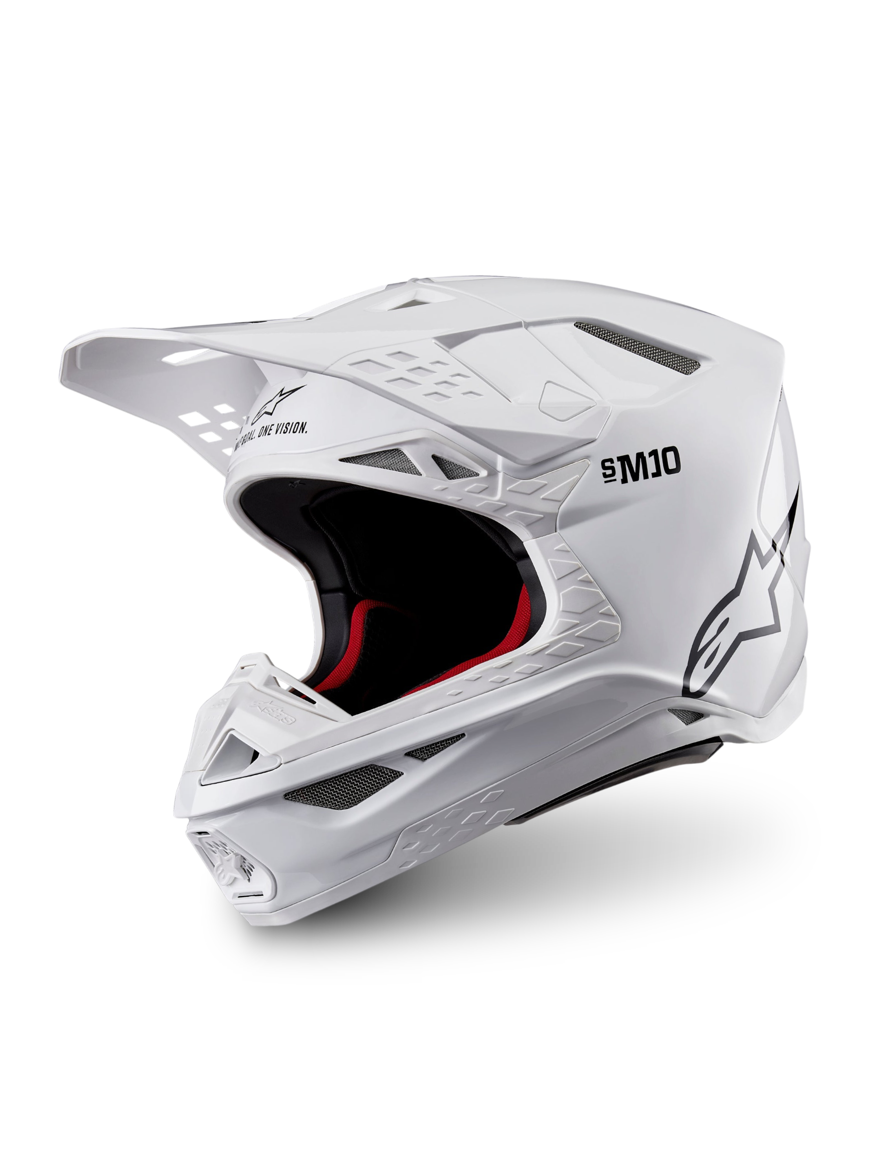 Alpinestars Supertech M10 Solid-hjelm, ECE 22.06-certificeret motocrosshjelm i blank hvid med sort og rød indvendig polstring, skyggevisir og flere ventilationsporte, vist i trekvart profil