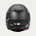 Alpinestars Supertech M10 Fame ECE 22.06 hjelm, set bagfra, mat og blank sort carbon, med synlig kulfibervævning, netventilationsåbninger, MIPS- og ECE-certificeringsmærkater og Alpinestars-logo.