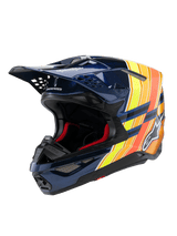 Alpinestars Supertech M10 TLD Edition 25 hjelm, motocross-hjelm, blank mørkeblå med orange og gul fluo-grafik, med rød indvendig polstring, aerodynamisk skal med flere ventilationsåbninger, Troy Lee Designs-branding på skyggen, professionelt off-road racingudstyr