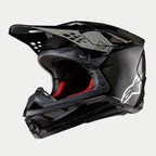 Alpinestars Supertech M10 Fame ECE 22.06 hjelm, motocrosshjelm, sort carbon i mat og blank finish, med synlig kulfibervævning, hvidt Astar-logo på siden og rød indvendig polstring, aerodynamisk off-road design