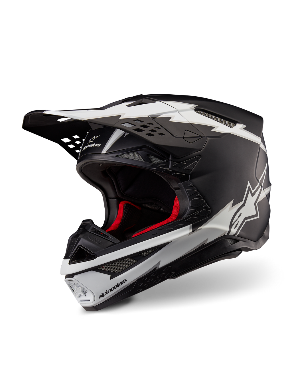 Alpinestars Supertech M10 Ampress hjelm, motocross-hjelm, mat sort og hvid, med markante hvide lyn-grafikker og stjerne-logoer, rødt indvendigt for, multi-komposit carbon-skal med en strømlinet aerodynamisk profil