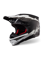 Alpinestars Supertech M10 Ampress hjelm, motocross-hjelm, mat sort og hvid, med markante hvide lyn-grafikker og stjerne-logoer, rødt indvendigt for, multi-komposit carbon-skal med en strømlinet aerodynamisk profil